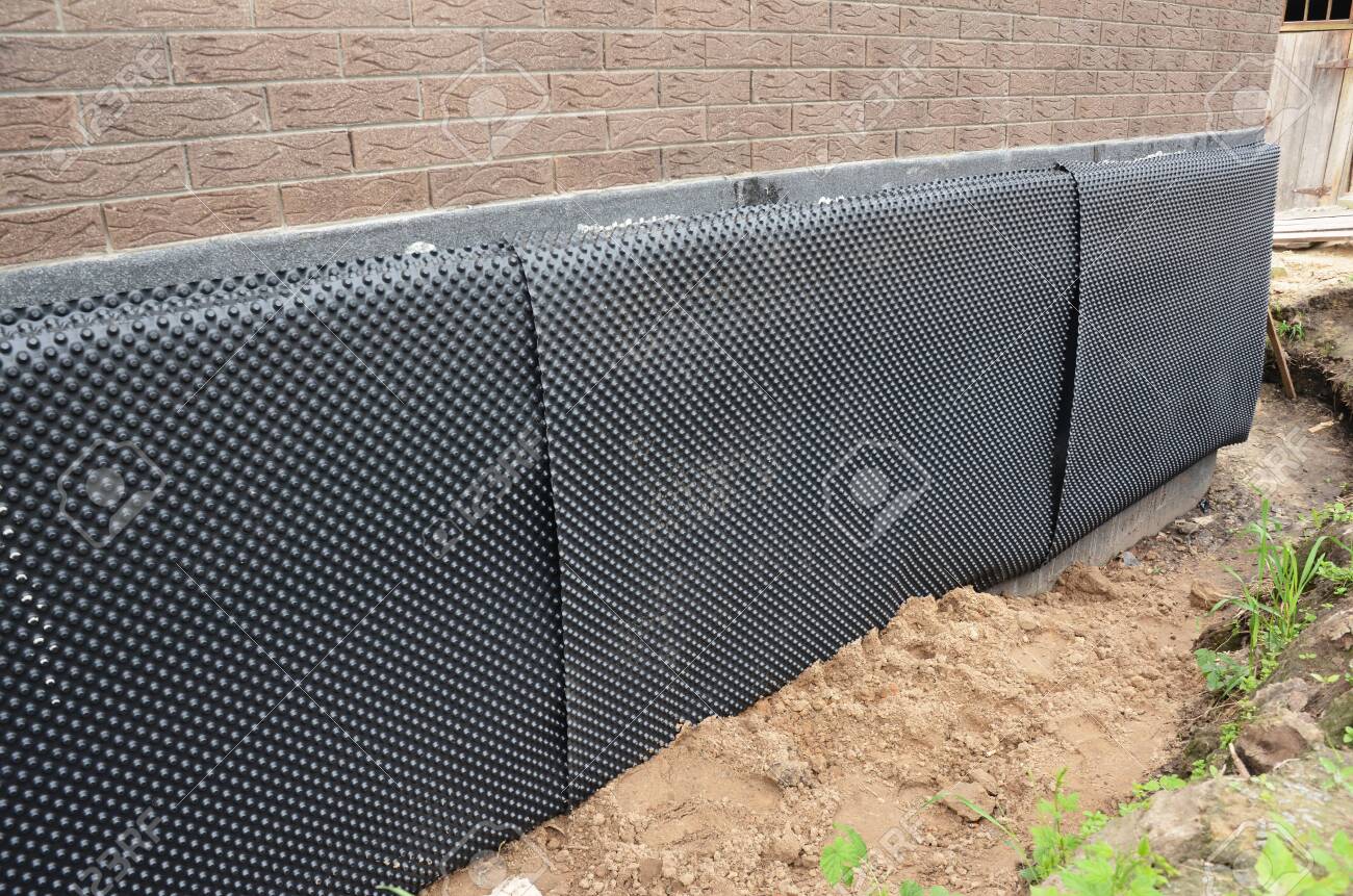 installing damp proof wall membrane